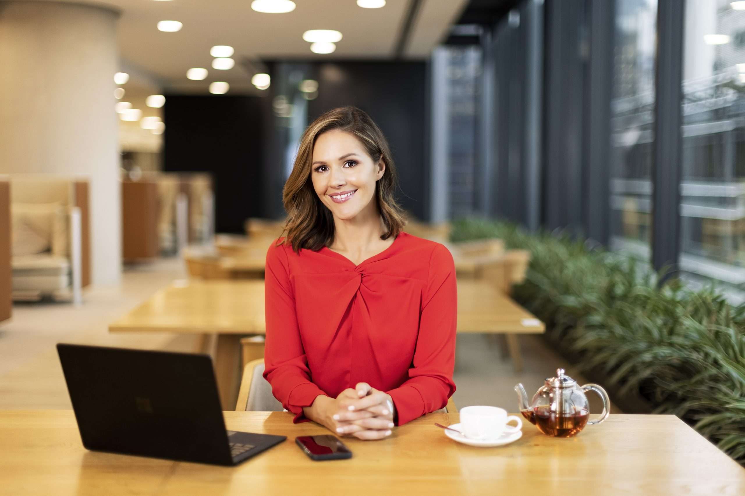 Jessica Ridley sitting at a desk